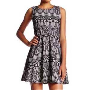 Want & Need- Woman’s Laced Fused Skater Dress